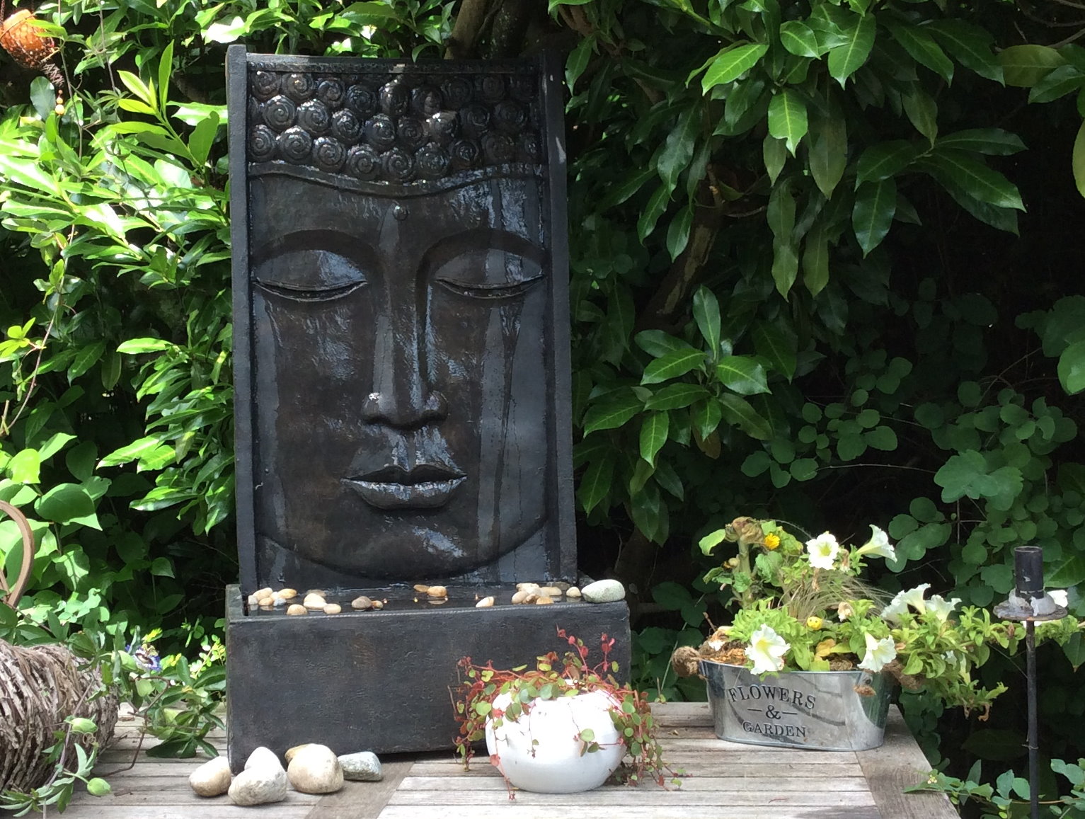 Bild Buddha-Brunnen im Garten zum Thema Seelenlauf & Philosophie